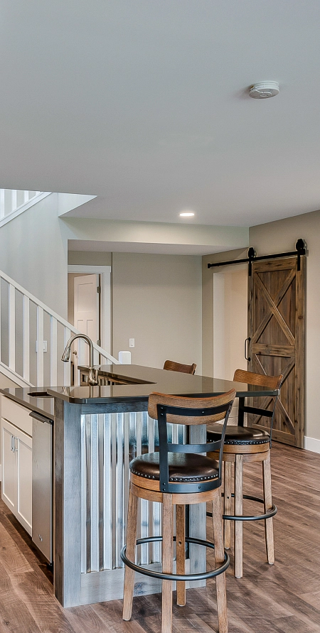 newly remodeled basement with countertop
